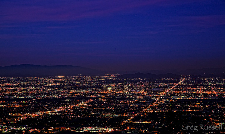 skyline of downtown phoenix arizona at sunset, as seen from south mountain park