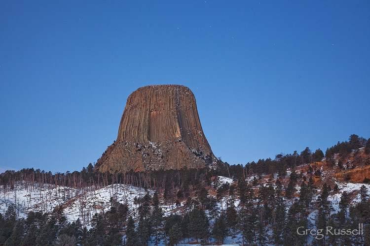 beautiful sunrise/moonset at devils tower national monument, wyoming