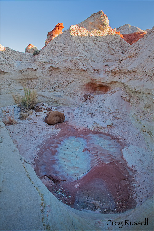 Colorful sunset light illuminates the badlands of the southern part of the Grand Staircase-Escalante National Monument, Utah