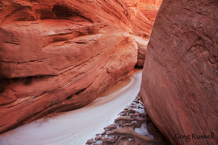 ice and sandstone in buckskin gulch, utah