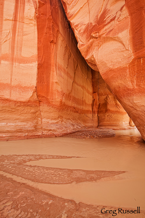 Sliderock arch is found near the confluence with Buckskin Gulch on the Paria River in southern Utah