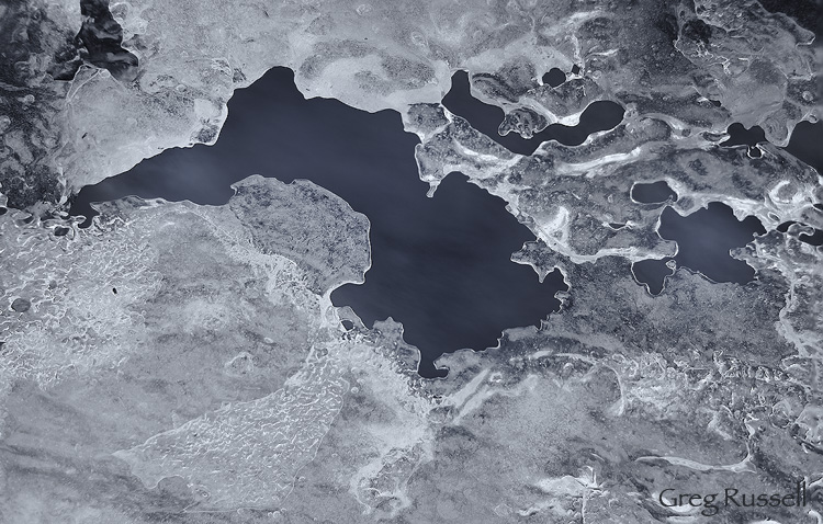 abstract image of ice on a small creek in central wyoming